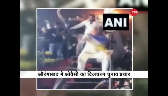 Asaduddin Owaisi performs a dance step in a rally in Aurangabad