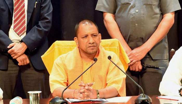 up state law commission recommends law against religious conversion gives  report to yogi adityanath | UP में बनेगा धर्मांतरण रोकने के लिए कानून,  स्टेट लॉ कमीशन ने सीएम योगी को सौंपी ...