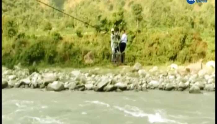 Chamba Villagers crossing river risking their life