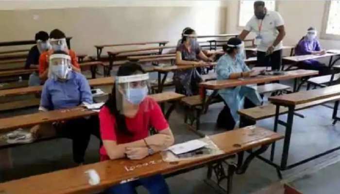 Image: https://hindi.cdn.zeenews.com/hindi/sites/default/files/styles/zm_700x400/public/2020/09/01/629916-jee-exam.jpg?itok=cQ-141WE JEE-NEET exams held despite all the political turmoil students said arrangements were better in Jharkhand JEE -