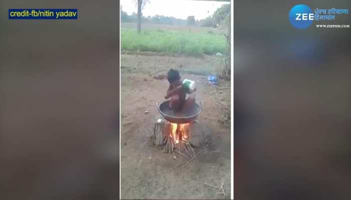 Child Bathing In Hot Water With Desi Jugarh