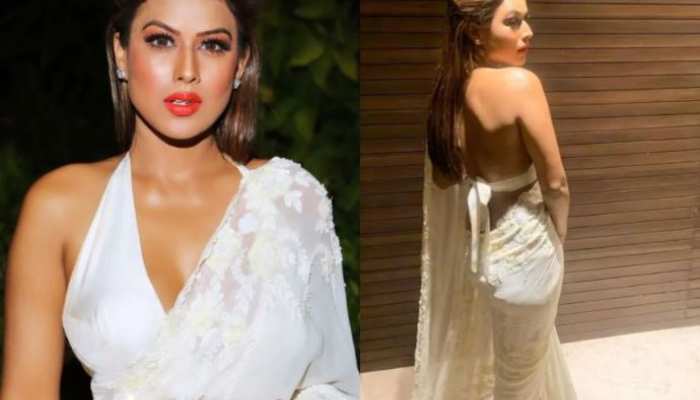 Nia Sharma ढा रही हैं सफेद साड़ी में कहर, नजरें हटाना हो जाएगा मुश्किल