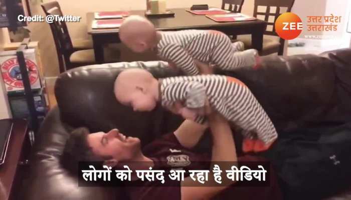 man doing workout with his baby video gone viral on social media uppm