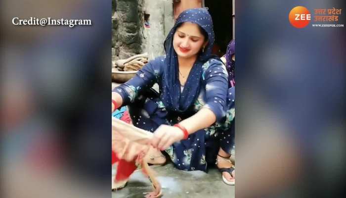 trending viral video of bhabhi smiles during washing clothes after seeing this video people said amazing smile desi bhabhi smile pcup