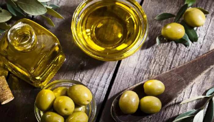 Make hair strong with the help of olive oil know here benefits of olive oil  for hair brmp | Olive oil for hair: झड़ते बालों का इलाज है यह 1 तेल, बस