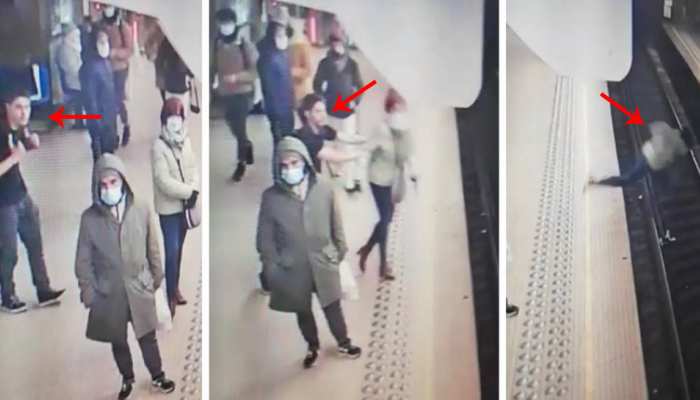तेज रफ्तार में आ रही ट्रेन के सामने शख्स ने महिला को दिया धक्का, देखें शॉकिंग Video