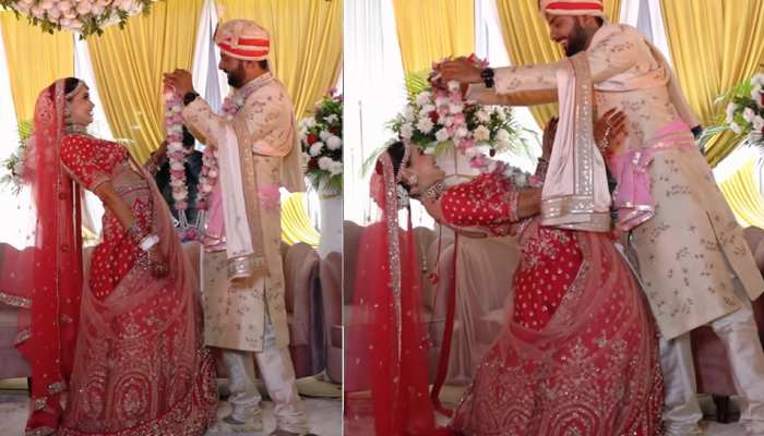Bride bend backward so much during jayamala become sensation on the internet | जयमाला के दौरान पीछे की तरफ इतना ज्यादा झुक गई दुल्हन, इंटरनेट पर इस वजह से मच गई सनसनी | Bride bend backward so much during jayamala become sensation on the internet | जयमाला के दौरान पीछे की तरफ इतना ज्यादा झुक गई दुल्हन, इंटरनेट पर इस वजह से मच गई सनसनी |