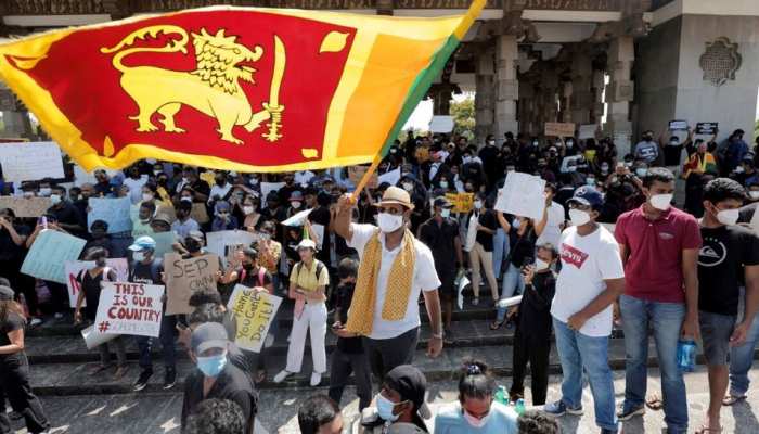 Sri Lanka economic crisis updates Sri Lanka defaults on entire $51 billion  external debt see details | Sri Lanka Economy Crisis: आर्थिक तंगी के सबसे  बुरे दौर से गुजर रहे पड़ोसी देश