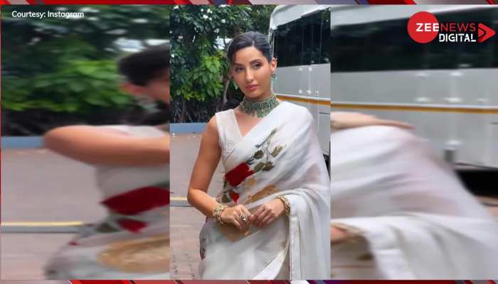 Nora Fatehi: फ्लोरल प्रिंट साड़ी में नोरा फतेही ने लगाई आग, फैंस का वीडियो पर आया दिल