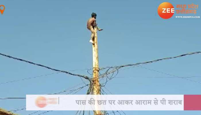बिजली के खंभे पर चढ़ा युवक, पुलिस ने दी एक क्वार्टर शराब तो उतरा नीचे VIDEO