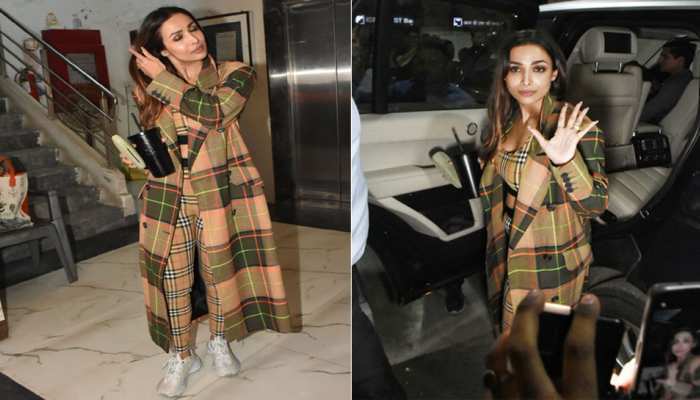 बालों को संवारते हुए नजर आईं Malaika Arora, कैमरे के सामने टैंक टॉप में ढाया कहर