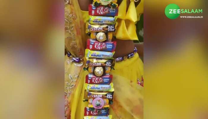 Video: दुल्हन ने गहनों की जगह पहन लिया चॉकलेट और कैंडी, लोग कर रहें वीडियो की तारीफ!
