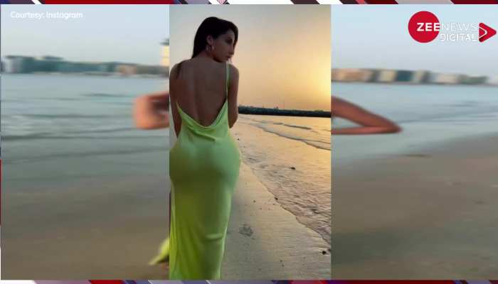 समंदर किनारे बैकलेस ड्रेस पहन Nora Fatehi ने दिखाया बेहद हॉट फिगर, सेक्सी लुक देख फैंस ने कहा- 'नोरा नूर है'...