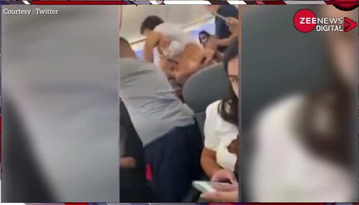 Viral: विंडो सीट को लेकर आपस में भिड़े यात्री, फ्लाइट में जमकर चले लात-घूसे, देखें वायरल हो रहा वीडियो