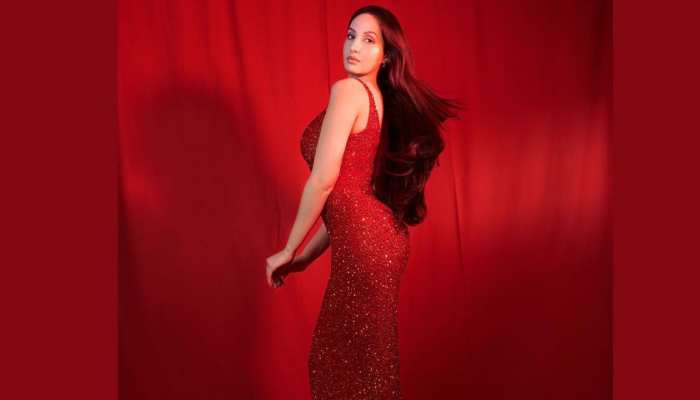 Nora Fatehi Video : रेड हॉट ड्रेस में एक्ट्रेस नोरा फतेही का तीखी लाल मिर्च वाला लुक मचा रहा बवाल