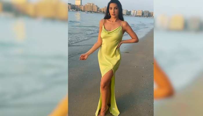 Nora Fatehi Video : नोरा फतेही ने बैकलेस ड्रेस पहन समंदर के किनारे छलकाया जाम