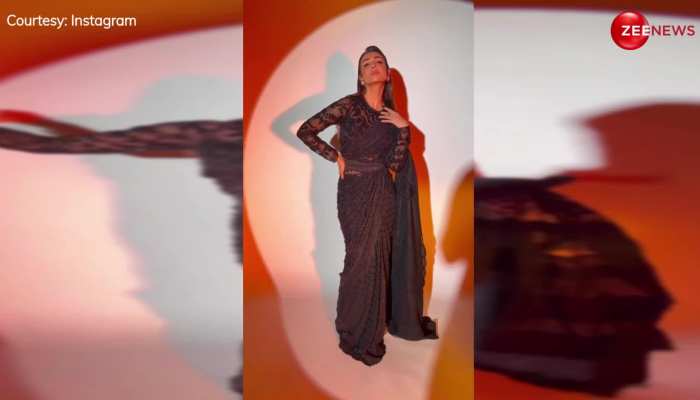 बेहद ब्लैक हॉट साड़ी में Malaika Arora लगीं गजब, फिर कैमरे पर दिए सेंसुअल पोज