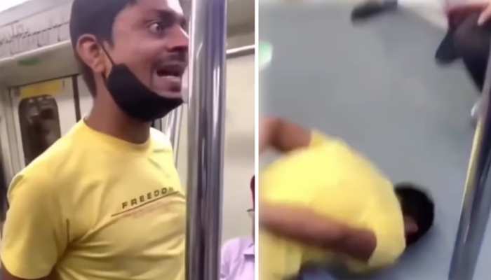 दारु के नशे में Delhi Metro में चढ़ा ये शख्स, यात्री के पैर छूकर कहने लगा ऐसी बात