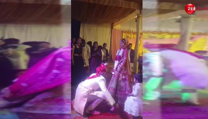 Viral: दुल्हा-दुल्हन ने-'खुला है मेरा पिंजरा' गाने पर किया स्टेज तोड़ डांस, वीडियो देख लोग बोले-क्या सुपर जोड़ी है