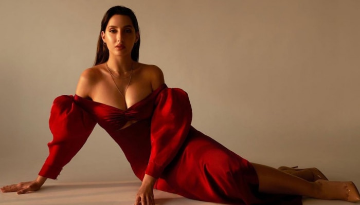 Nora Fatehi: हाय गर्मी... लाल ड्रेस में नोरा फतेही की अंगड़ाई देख फैंस हुए बेकाबू, एक ने बोलो- I Love YoU