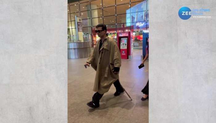 Karan Johar spotted at airport: मुंबई एयरपोर्ट पर स्पॉट हुए  Karan Johar, निर्माता के इस oversize outfit ने खींचा लोगों का ध्यान 