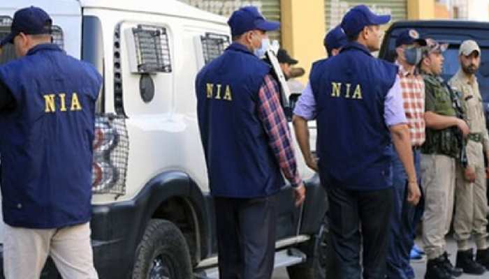 NIA raids 14 places linked to CPI Maoist in Bihar Jharkhand | NIA Raids:  बिहार-झारखंड में NIA छापेमारी से मचा हड़कंप, CPI (M) से जुड़े 14 ठिकानों पर  मारी रेड | Hindi