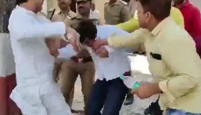 VIDEO: BJP नेत्री के पति को SP MLA ने थाने में लात-घूंसों से पीटा, जमकर हुआ हंगामा