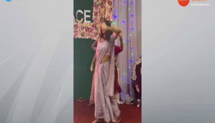 college Girl video: साड़ी पहन लड़की ने किए ऐसे डांस मूव्स, देखते रह गए टीचर्स https://english.cdn.zeenews.com/static/apprun/fallbackimages/hindi800x400.svg