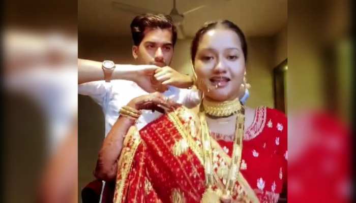 Viral video : सुहागरात पर पति पत्नी कर रहे थे प्यार , पत्नी ने कर दिया कैमरा ऑन तो रिकॉर्ड हो गया वीडियो https://english.cdn.zeenews.com/static/apprun/fallbackimages/hindi800x400.svg