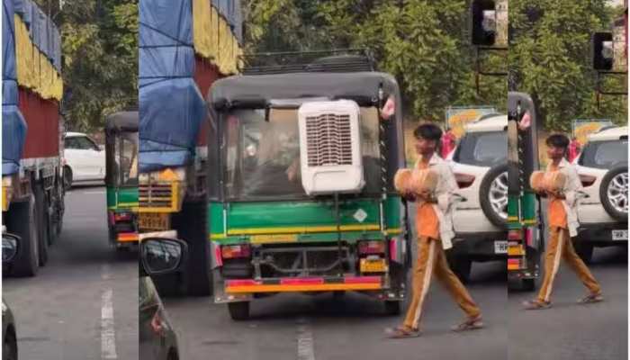 Desi Jugad : Auto में देसी जुगाड़ से लगा दिया कूलर, अब यात्री भी लेंगे AC वाला मजा https://english.cdn.zeenews.com/static/apprun/fallbackimages/hindi800x400.svg