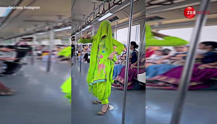 देसी चाची ने दिल्ली की मेट्रो में हरियाणवी गाने पर मारे ऐसे लटके-झटके, देख हक्के-बक्के रह गए लोग 
