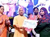 CM Yogi distribute free LPG cylinder under Pradhan Mantri Ujjwala Yojana