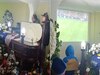 Family pauses funeral to watch match