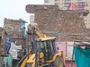 Bulldozer Action: कोर्ट का स्टे मिलने के बावजूद भी झुग्गियों को गिराया, अशोक विहार में जमकर चला बुलडोजर 