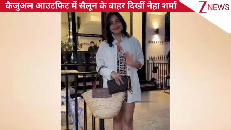 शॉर्ट ड्रेस और लूज व्हाइट शर्ट में सैलून से बाहर निकलते समय स्पॉट हुईं Neha Sharma, प्यारी सी स्माइल पर फिदा हुए फैंस!