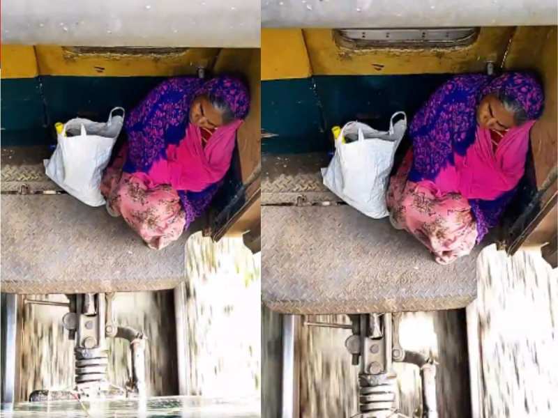 हल्की सी चूक में जा सकती है जान, बोगी के पायदान पर बैठकर सफर करने पर मजबूर बुजुर्ग महिला